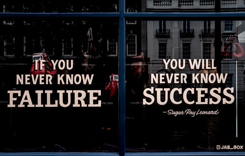 Shop window with writing on two panes. First pane is “If you never know failure”, second pain is “you will never know success